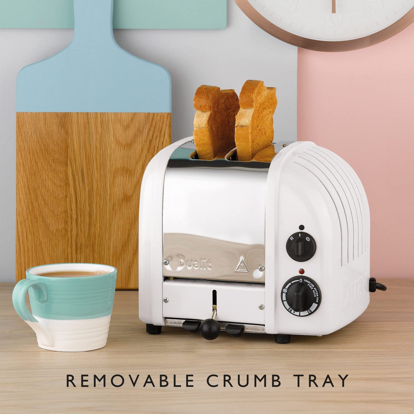 Dualit Classic White Toaster: 2-slice handmade toaster, replaceable elements, defrost, mechanical timer, durable premium design.
